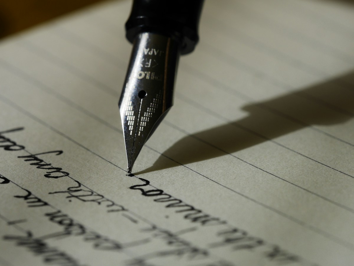 Handwritten planning notes and a pen, reflecting thoughtful decisions and attention to detail